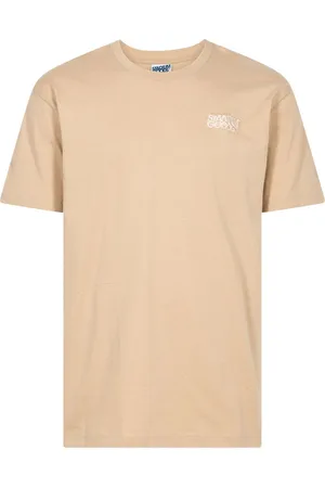 STADIUM GOODS® Stacked logo "Tonal Sand" T-shirt