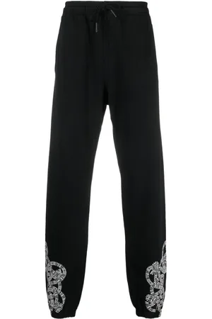 MARCELO BURLON Logo-print organic-cotton track pants