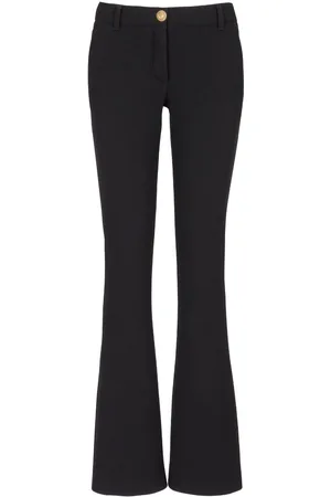 Balmain Virgin wool crepe-texture flared trousers