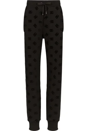 Dolce & Gabbana Logo-flocked cotton track pants