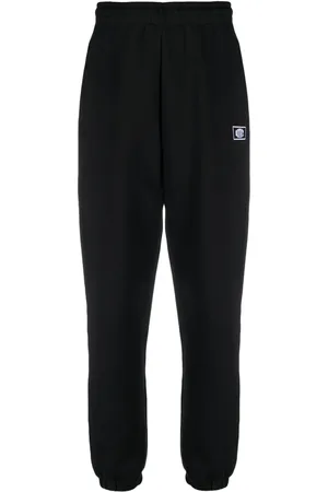 ROTATE Logo-embroidered organic cotton track pants