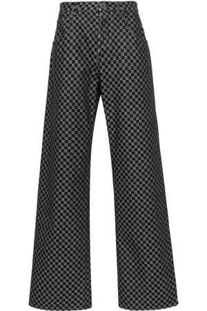 Balmain Monogram-pattern long-length wide-leg jeans
