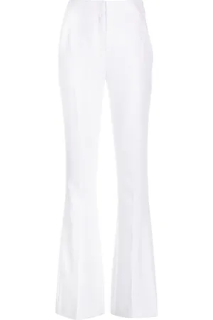 GENNY Iconic high-waist flared trousers