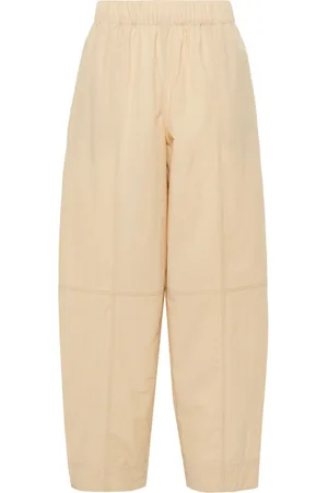 Ganni Curve tapered-leg trousers