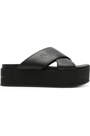 Calvin Klein Logo-debossed flatform slides