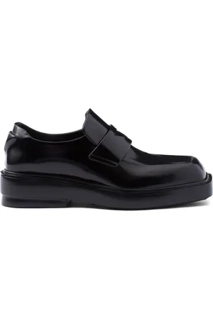 Prada Triangle-patch leather loafers