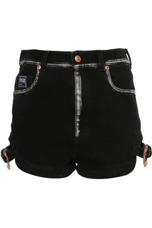 VERSACE Logo-engraved denim shorts