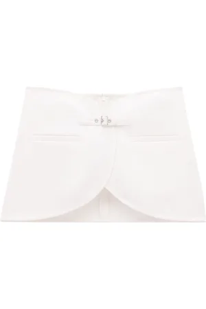 Courrèges Ellipse buckled curved miniskirt