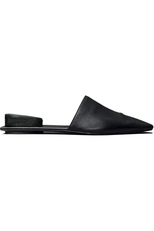 Tory Burch Pierced leather slippers