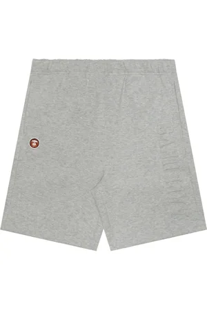 A Bathing Ape Logo-embossed mélange-effect track shorts