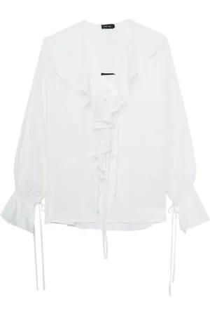 tout a coup Lace-up ruffled blouse