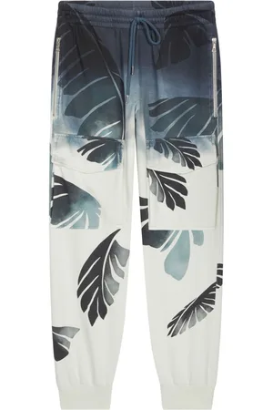 DRIES VAN NOTEN Palm-printed trousers