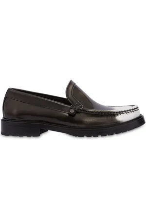 Moschino Distressed-effect leather loafers