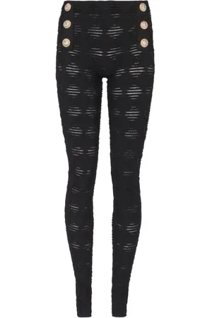 Balmain Embossed-button open-knit leggings