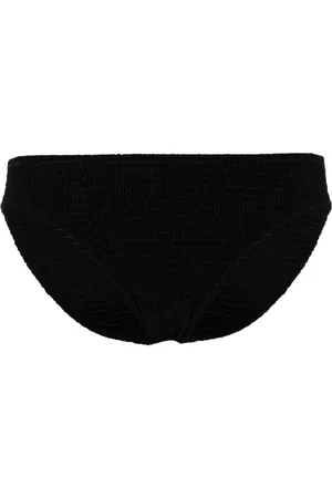 Totême Mid-rise smocked bikini bottoms