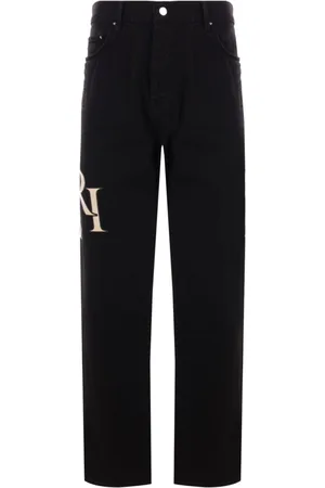 AMIRI Staggered Logo Jeans