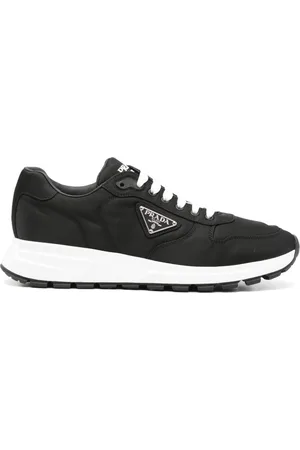 Prada Triangle-plaque panelled sneakers