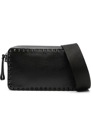 VALENTINO GARAVANI Rockstud-embellished messenger bag