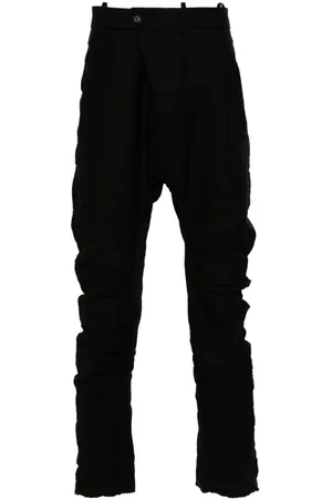 MASNADA Distressed-effect trousers
