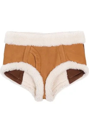 Natasha Zinko Trimmed sheepskin mini shorts