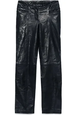 REMAIN Slim-fit leather trousers