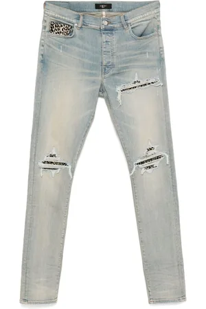 AMIRI Leopard-detail jeans