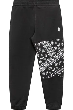MARCELO BURLON Bandana-print track pants
