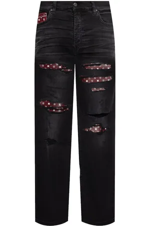 AMIRI Distressed bandana-detail jeans