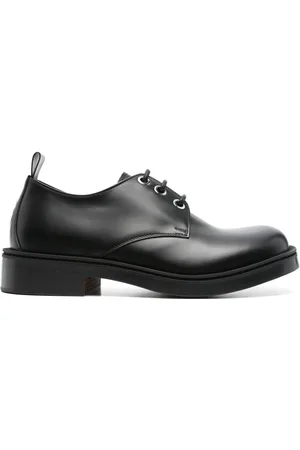 Alexander McQueen Skull-embossed Derby shoes