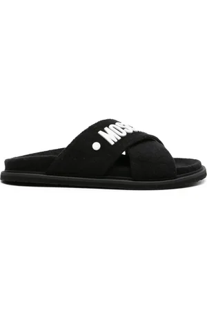 Moschino Logo-embossed crossover-strap sandals