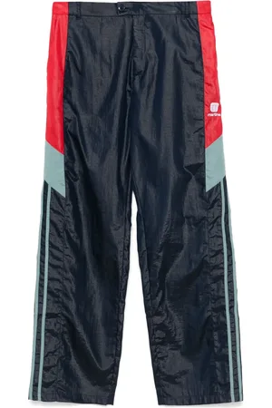 MARTINE ROSE Logo-embroidered track pants
