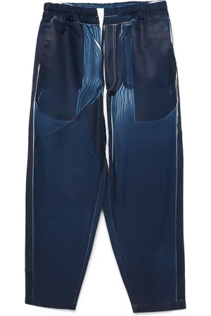 Comme des Garçons Denim-print trousers