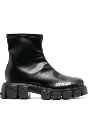 Moschino 50mm logo-print studded sole boots