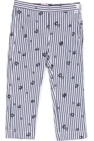 Il gufo Side zip-fastening striped trousers