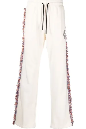 MARCELO BURLON Fringe-detailing jersey track-pant
