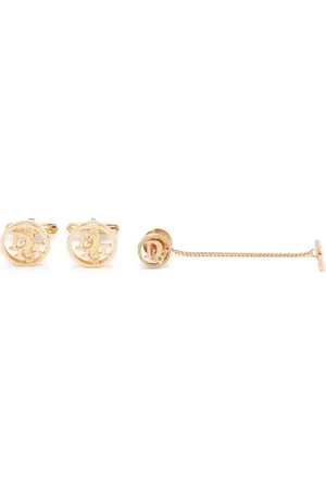 Dior 1990s logo-letters brooch and cufflinks set