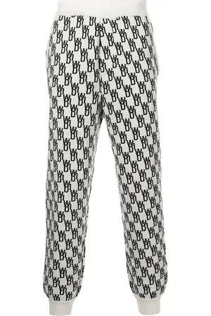 We11 Done Monogram intarsia-knit track pants