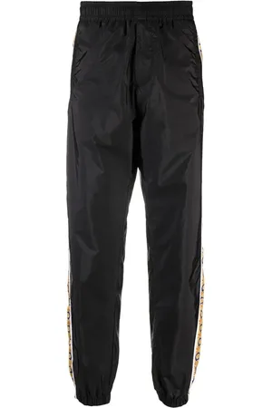 VERSACE Graphic-stripe taffeta track pants