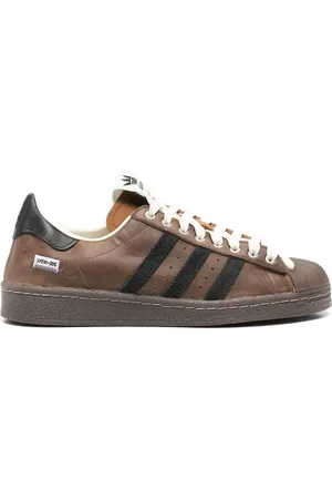 SONG FOR THE MUTE X Adidas Superstar trainers