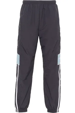 MARTINE ROSE Logo-embroidered track pants
