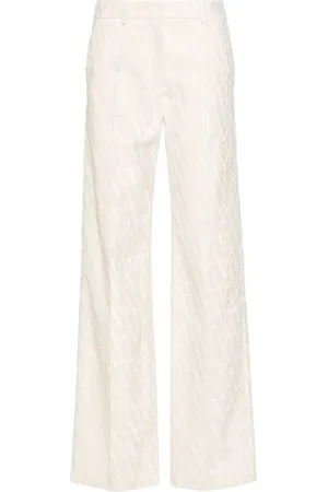 VALENTINO GARAVANI Toile Iconographe flocked tailored trousers