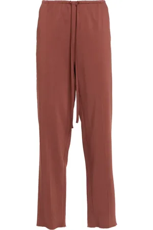 FORTE FORTE Pressed-crease tapered-leg trousers
