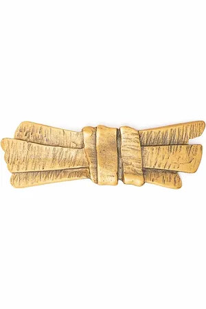 Saint Laurent 1980s engraved bow brooch