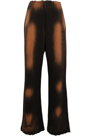 We11 Done Distressed track pants