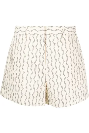 REMAIN Abstract-print cotton tailored shorts