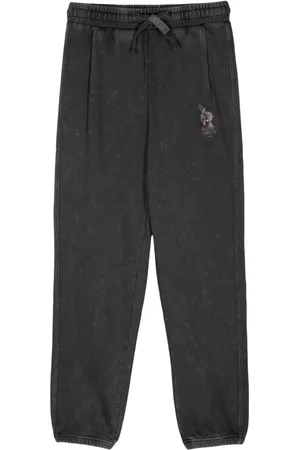 Musium Div. Drawstring logo-print trousers