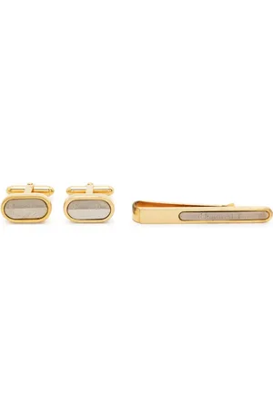 Dior 1980s logo-embossed tie clip and cufflinks set