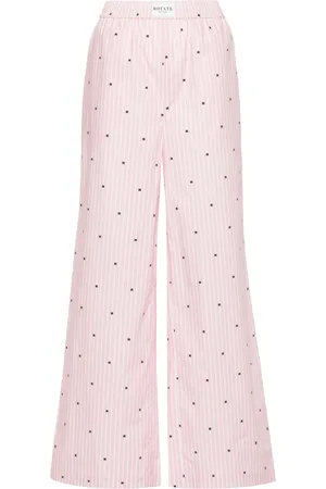 ROTATE Logo-print striped straight trousers