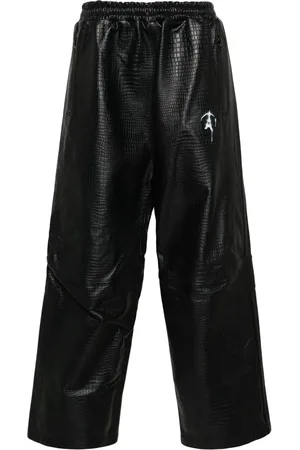 DOUBLET Crocodile-pattern leather track pants