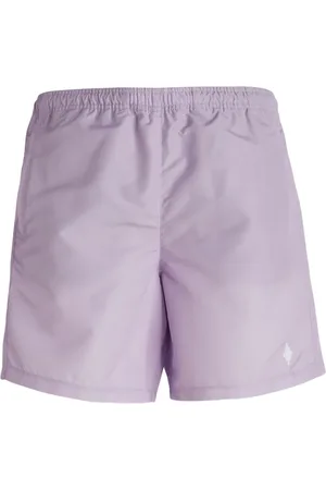 MARCELO BURLON Logo-embroidered swim shorts